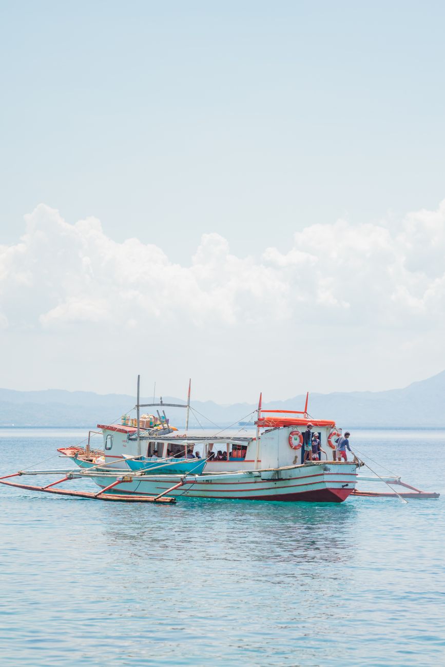 traditional boats on a clear blue sea